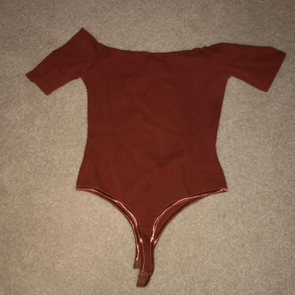 orange body suit